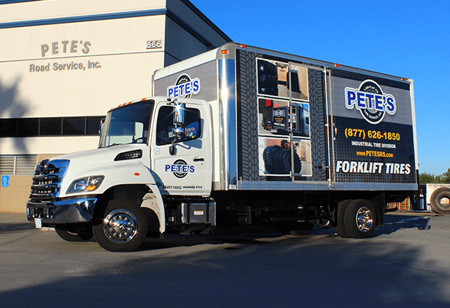 Delivery truck advertising forklift tires